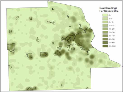 Map showing new dwellings per square mile with a color gradient.