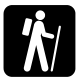 Icon depicting a hiker with a backpack and walking stick.